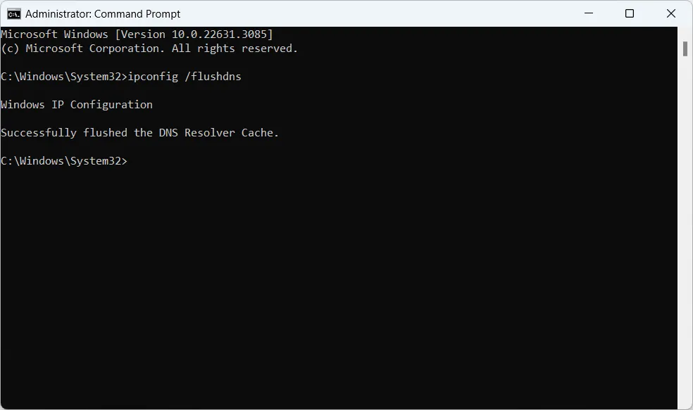 Command prompt pentadbir Windows yang menunjukkan pelaksanaan ipconfig flushdns yang berjaya