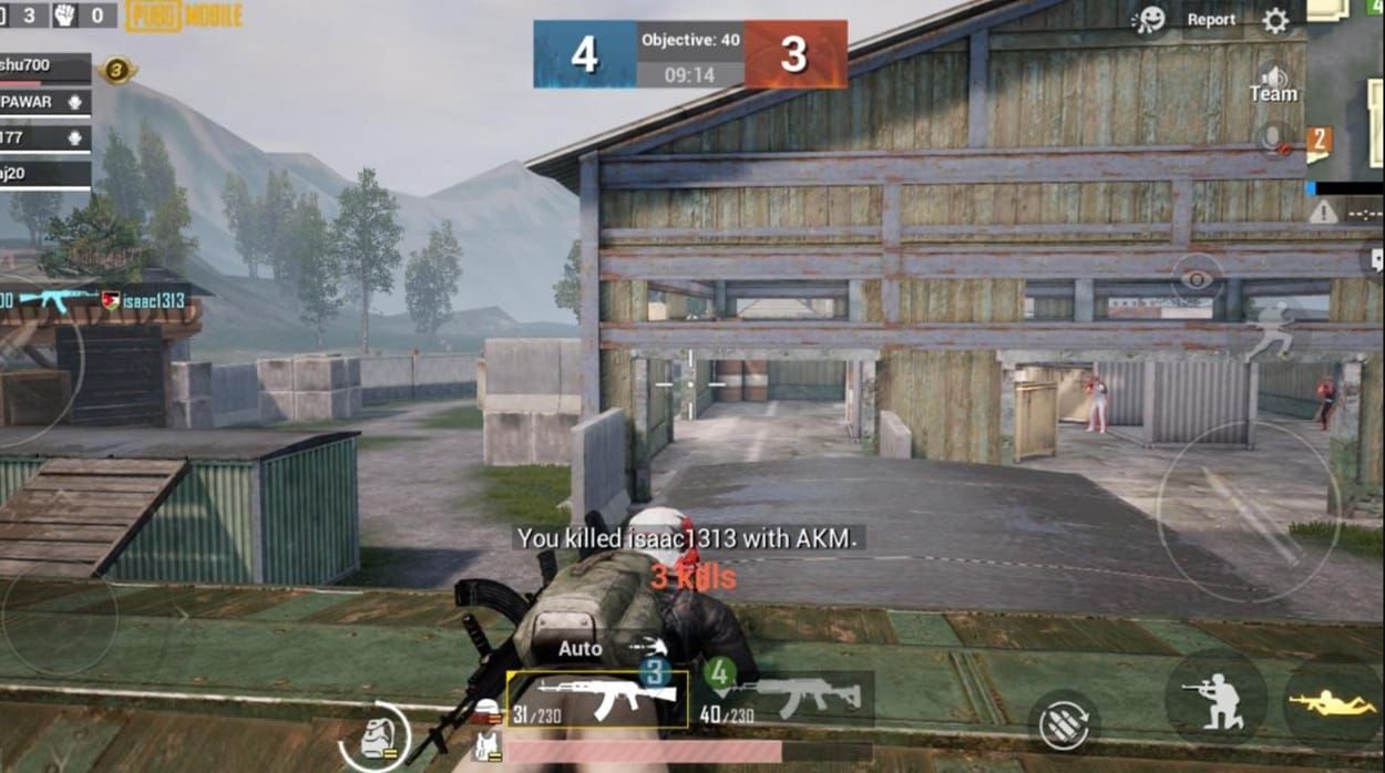PUBG Mobile Stadium intense combat scene showing multiple players in close-quarters engagement