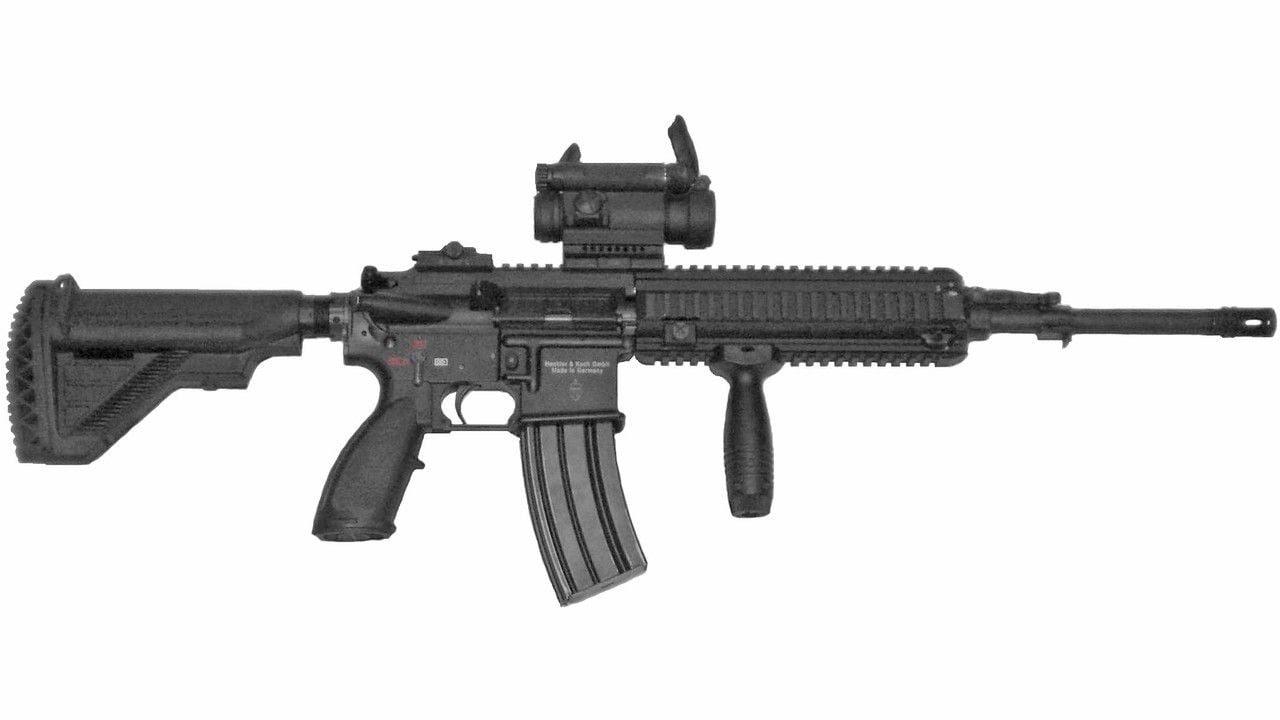 M416 HK416 assault rifle with red dot and vertical foregrip