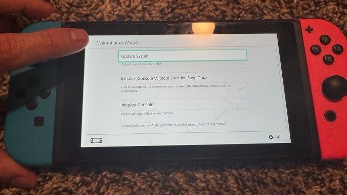 Obrazovka režimu údržby Nintendo Switch zobrazující možnost Initialize Console Without Deleting Save Data