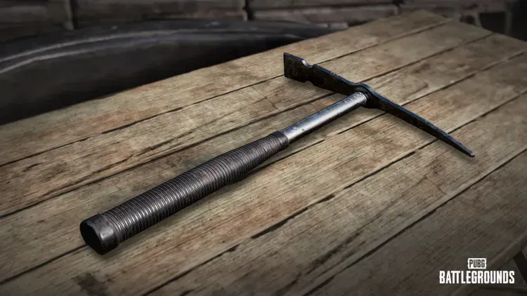 PUBG Mobile player using Pickaxe to destroy bamboo structures on Rondo map