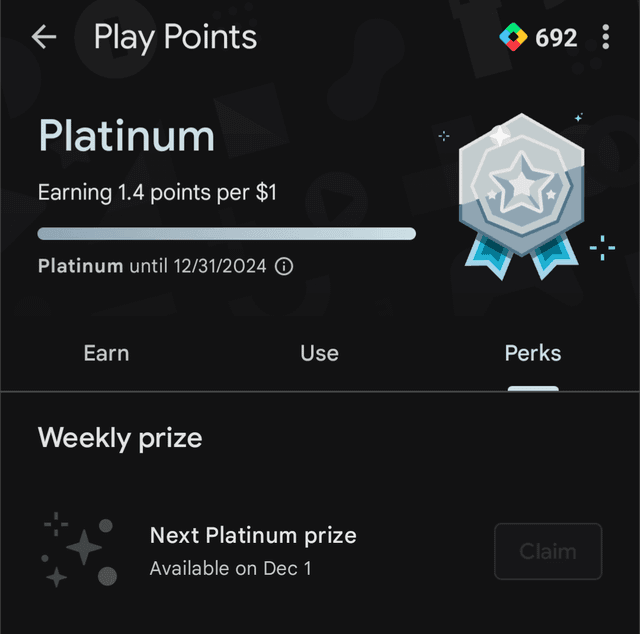 Pandangan dekat tab Perks Google Play Store yang menyerlahkan butang tuntutan mata bonus mingguan