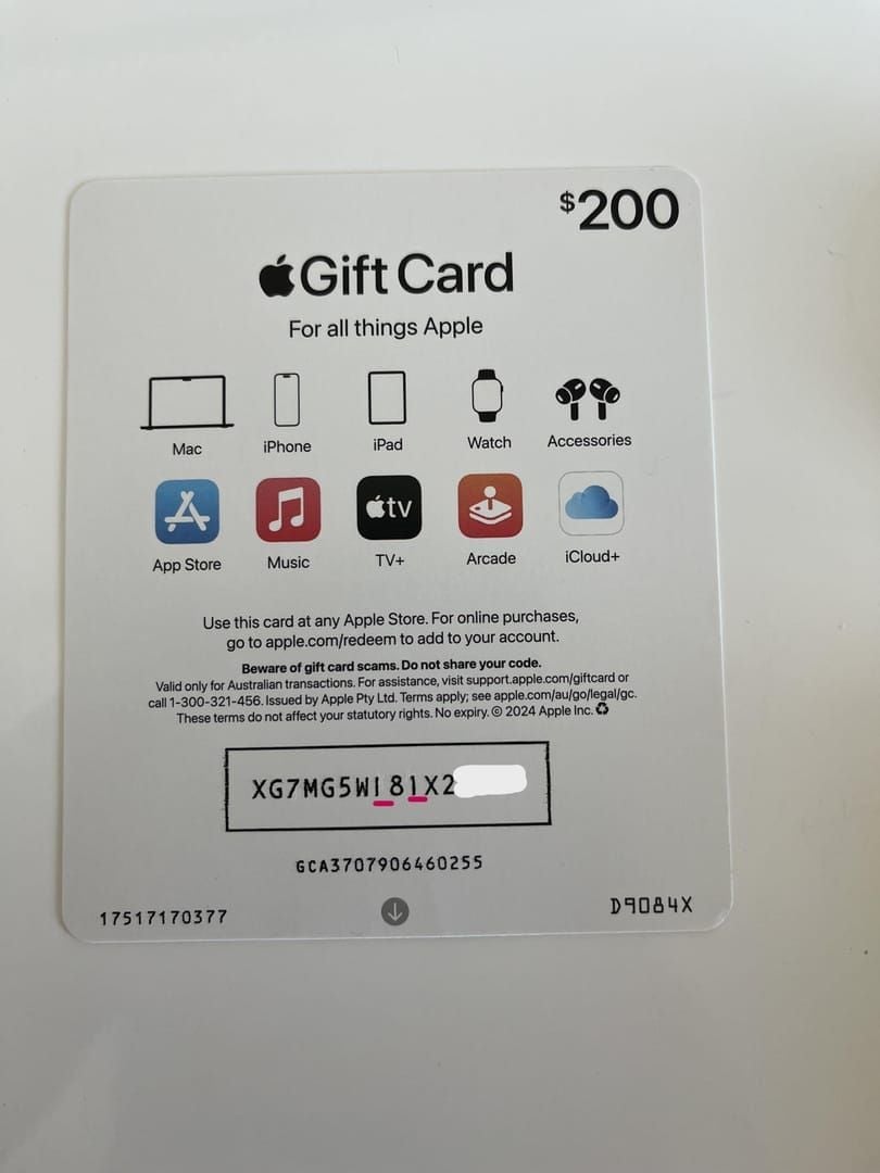 Comparison of legitimate and tampered Apple Gift Card (US) showing PIN sticker tears and re-adhesion marks